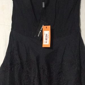 A brand New  Black Karen Millen cocktail dress.